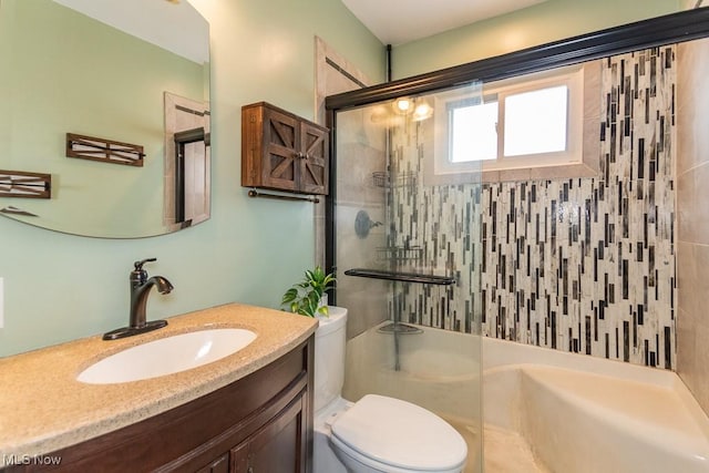 full bath with an enclosed shower, toilet, and vanity