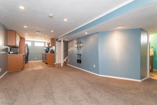 unfurnished living room with stairway, light colored carpet, baseboards, and recessed lighting