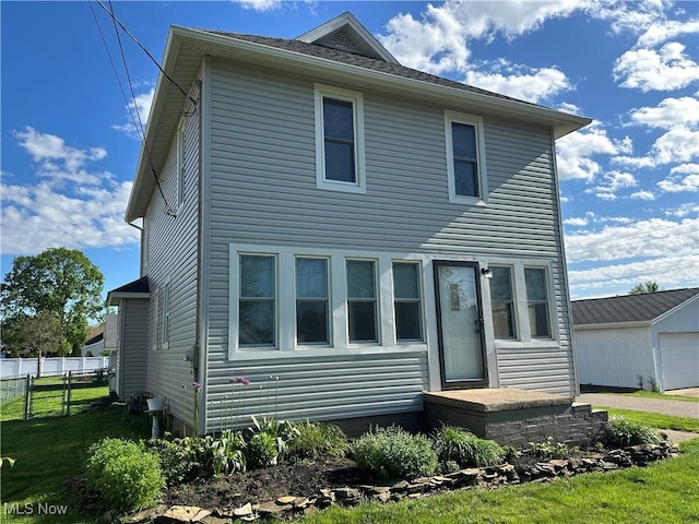 1905 Pine St SE, East Sparta, OH 44626 - view of front facade with an outbuilding and fence