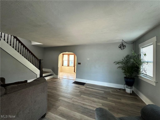 1905 Pine St SE, East Sparta, OH 44626 - foyer featuring plenty of natural light, visible vents, arched walkways, and stairway