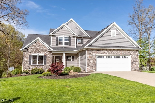 view of front of property with stone siding, concrete driveway, a shingled roof, and a front yard