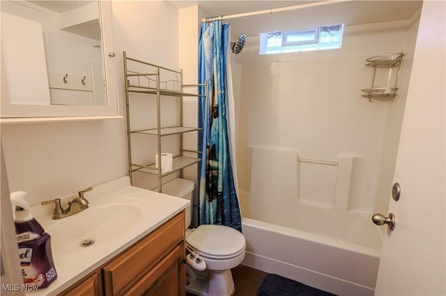 bathroom featuring toilet, shower / bath combo, and vanity