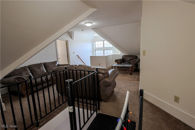 bonus room featuring carpet flooring and vaulted ceiling