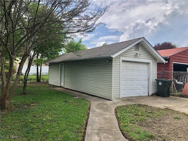 garage featuring fence