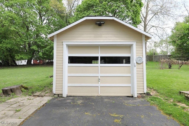 garage featuring fence