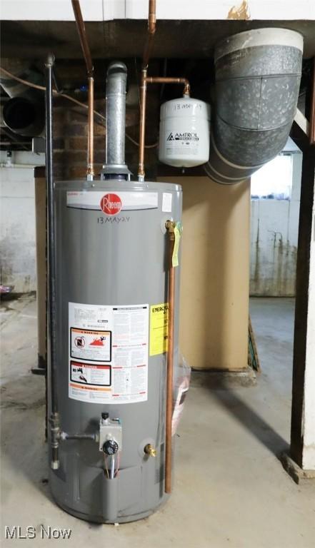 utility room with water heater