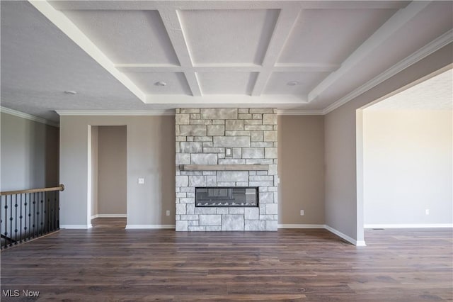 unfurnished living room with baseboards, a fireplace, coffered ceiling, and wood finished floors