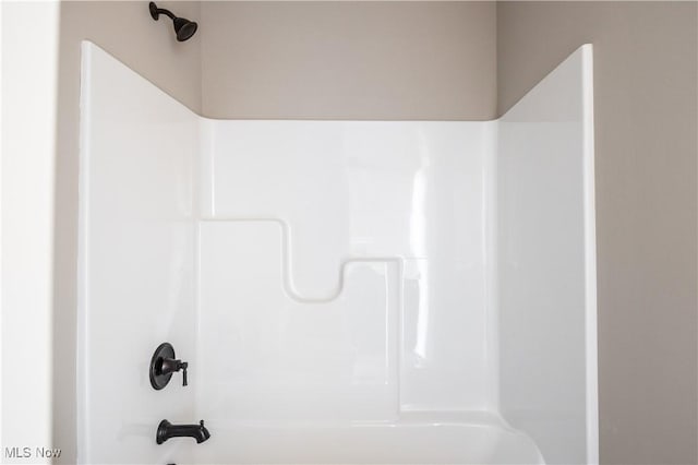 room details with bathing tub / shower combination