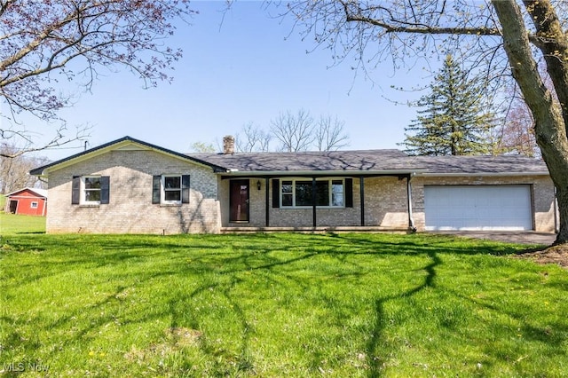 4820 Alabama Ave SW, Navarre, OH 44662 - ranch-style house featuring a chimney, driveway, brick siding, an attached garage, and a front lawn