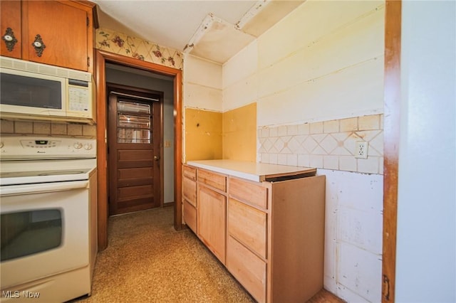 4820 Alabama Ave SW, Navarre, OH 44662 - kitchen featuring white appliances and light countertops