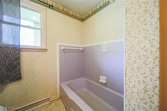 4820 Alabama Ave SW, Navarre, OH 44662 - bathroom with wallpapered walls, a bathtub, and a baseboard heating unit