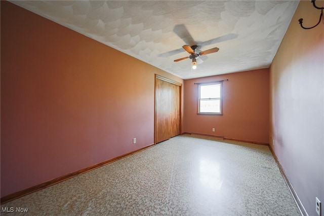 4820 Alabama Ave SW, Navarre, OH 44662 - unfurnished room featuring baseboards and ceiling fan