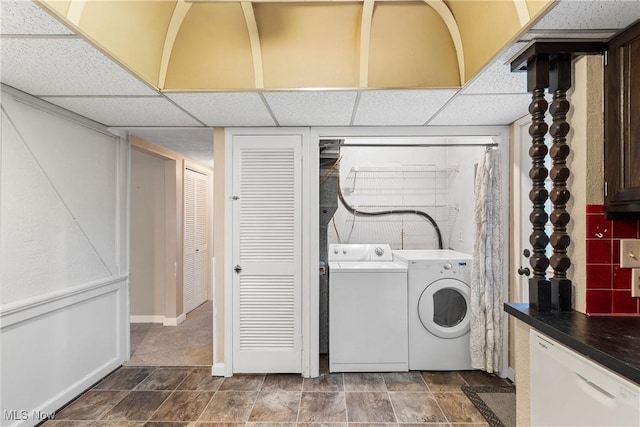 clothes washing area with washing machine and dryer and laundry area