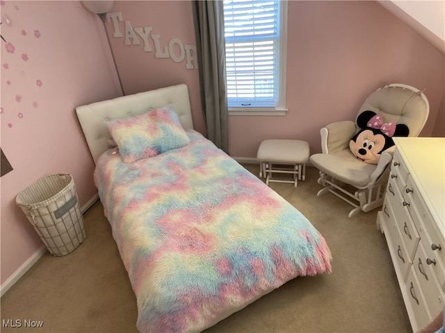carpeted bedroom with baseboards