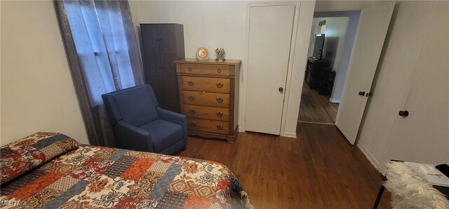 bedroom featuring wood finished floors