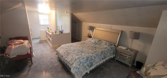 bedroom with dark colored carpet