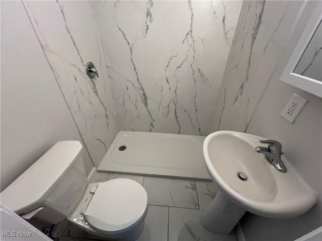 1279 Lander Rd, Mayfield Heights, OH 44124 - full bathroom featuring toilet, marble finish floor, a shower stall, and a sink