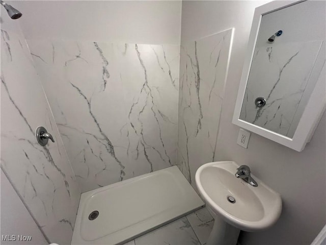 1279 Lander Rd, Mayfield Heights, OH 44124 - bathroom with a sink, a marble finish shower, and marble finish floor