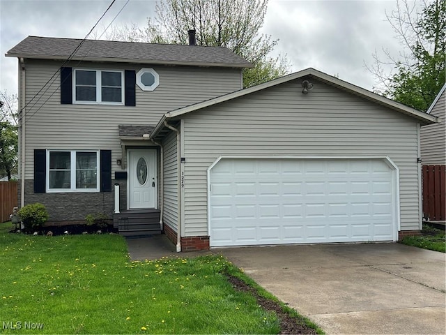 1279 Lander Rd, Mayfield Heights, OH 44124 - traditional-style home featuring a front yard, driveway, and a garage