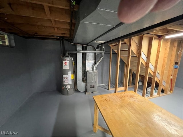 1279 Lander Rd, Mayfield Heights, OH 44124 - unfinished below grade area featuring water heater, heating unit, and stairs