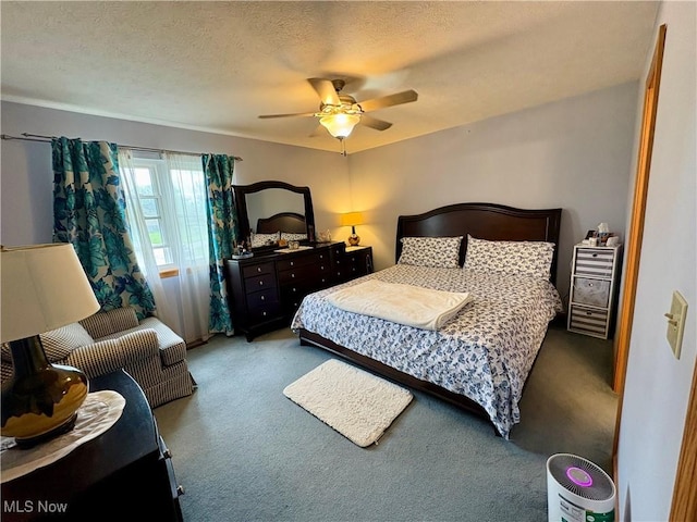 bedroom with carpet flooring and a ceiling fan