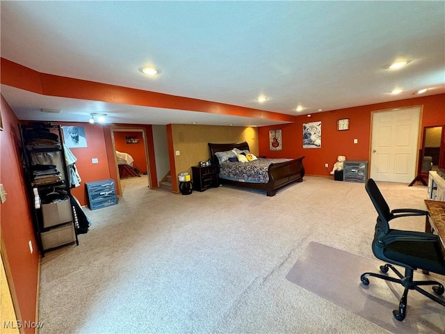 carpeted bedroom featuring recessed lighting