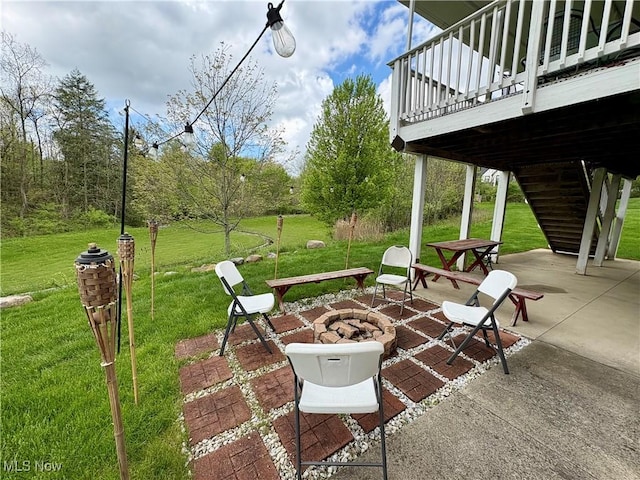 view of patio featuring a fire pit
