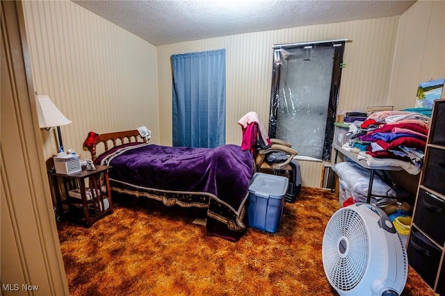 4991 Walnut St, Sugarcreek, OH 44681 - bedroom featuring a textured ceiling, carpet, and access to outside