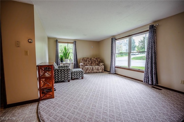4991 Walnut St, Sugarcreek, OH 44681 - sitting room featuring baseboards, visible vents, and carpet
