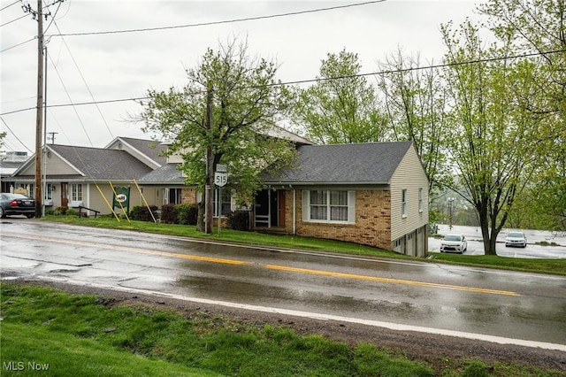 4991 Walnut St, Sugarcreek, OH 44681 - view of front of home featuring brick siding