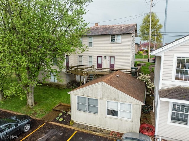 4991 Walnut St, Sugarcreek, OH 44681 - back of house featuring uncovered parking