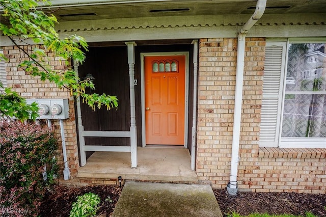 4991 Walnut St, Sugarcreek, OH 44681 - view of exterior entry with brick siding