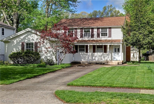4840 W 228th St, Fairview Park, OH 44126 - view of front of house featuring a front yard and a porch