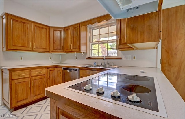 4840 W 228th St, Fairview Park, OH 44126 - kitchen featuring black electric cooktop, a sink, dishwasher, brown cabinets, and light countertops