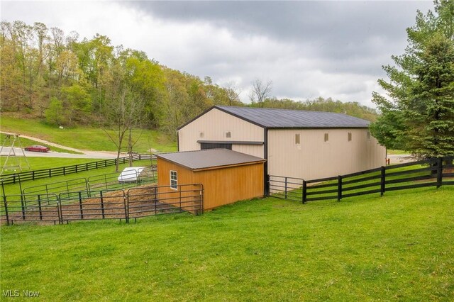 4661 Sugar Grove Rd, Cambridge, OH 43725 - view of yard with an outdoor structure and an exterior structure