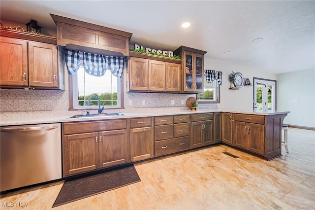 4661 Sugar Grove Rd, Cambridge, OH 43725 - kitchen featuring a sink, a peninsula, tasteful backsplash, light countertops, and stainless steel dishwasher