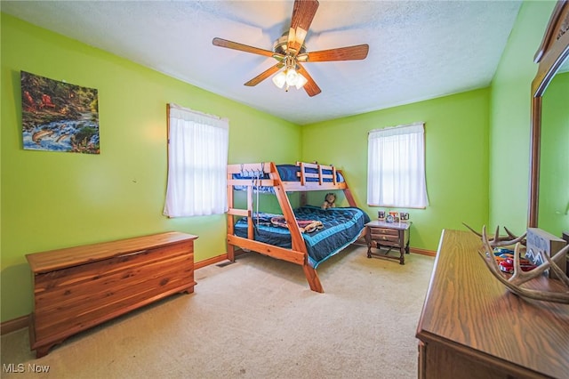 4661 Sugar Grove Rd, Cambridge, OH 43725 - bedroom with a textured ceiling, carpet flooring, baseboards, and a ceiling fan