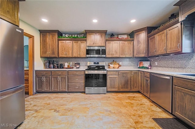 4661 Sugar Grove Rd, Cambridge, OH 43725 - kitchen with recessed lighting, light countertops, stainless steel appliances, and backsplash