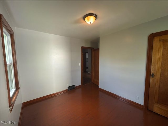 131 Blake St, Elyria, OH 44035 - unfurnished room featuring plenty of natural light, baseboards, visible vents, and wood finished floors