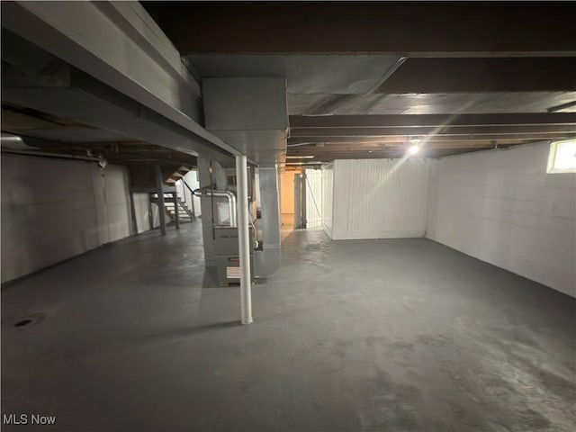131 Blake St, Elyria, OH 44035 - basement featuring stairway and heating unit