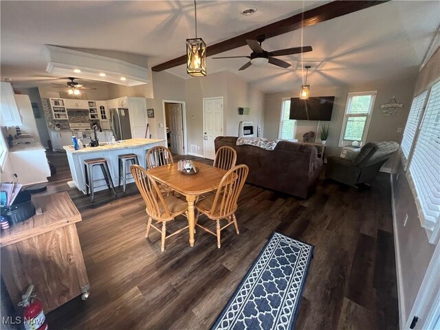37080 Penrose Ln, Cadiz, OH 43907 - dining area featuring a ceiling fan, dark wood-style floors, and baseboards