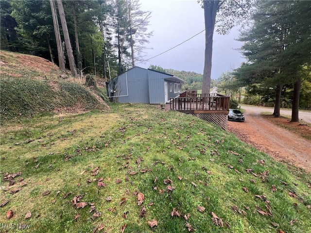 37080 Penrose Ln, Cadiz, OH 43907 - view of grassy yard featuring a wooden deck