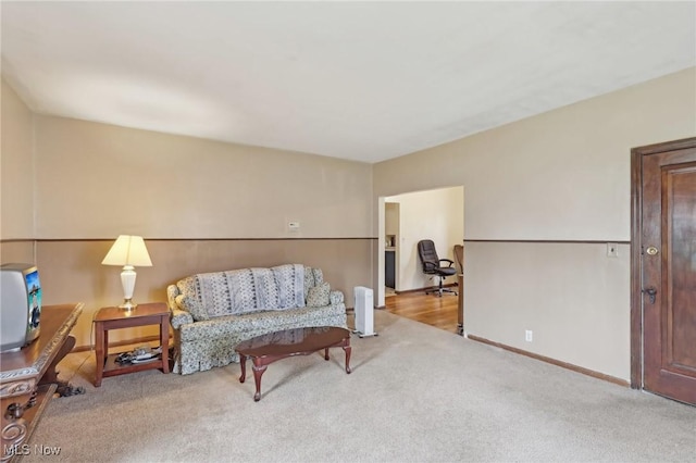 2419 Carpenter Rd, Ashtabula, OH 44004 - living area with carpet floors and baseboards