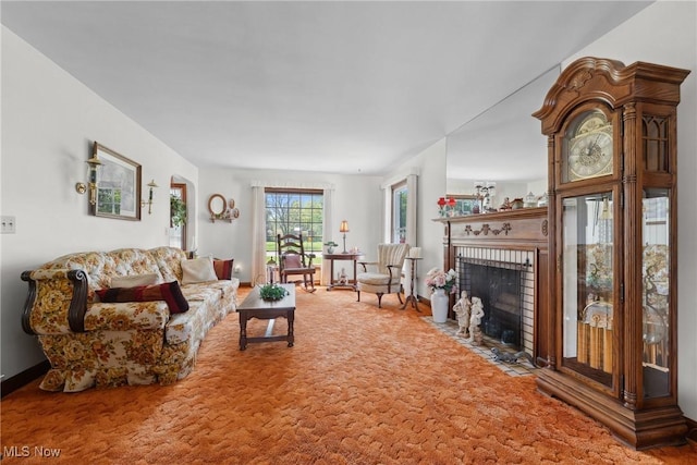 living room featuring a fireplace