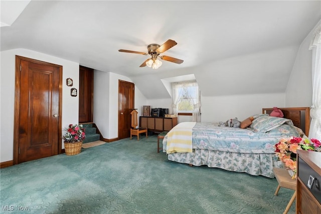 bedroom featuring lofted ceiling, carpet flooring, ceiling fan, and baseboards