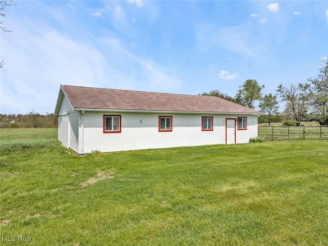 1250 Alamo Rd SE, Carrollton, OH 44615 - rear view of house with a yard and fence