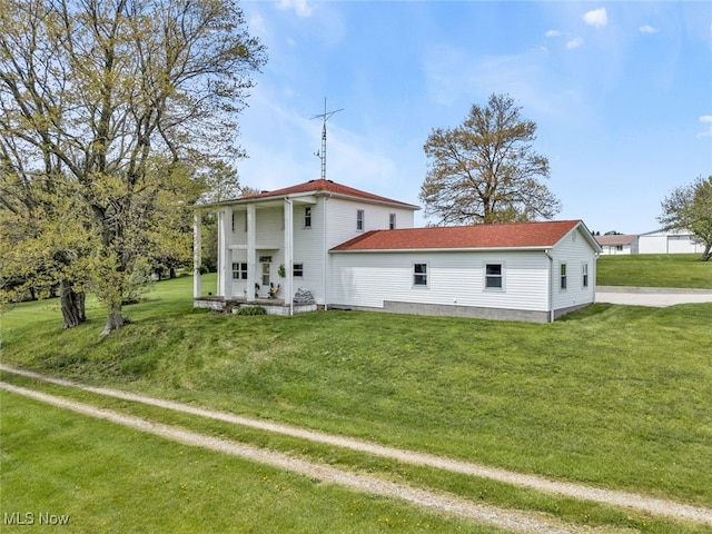 1250 Alamo Rd SE, Carrollton, OH 44615 - back of house with a lawn
