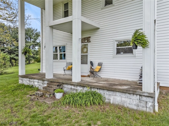 1250 Alamo Rd SE, Carrollton, OH 44615 - property entrance with a porch and a yard
