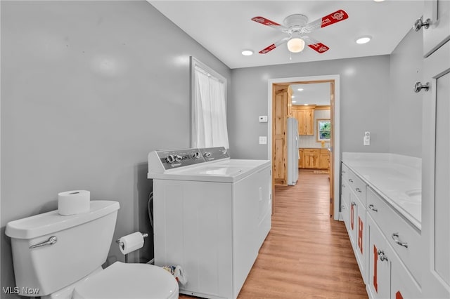 1250 Alamo Rd SE, Carrollton, OH 44615 - bathroom featuring a ceiling fan, toilet, vanity, and wood finished floors