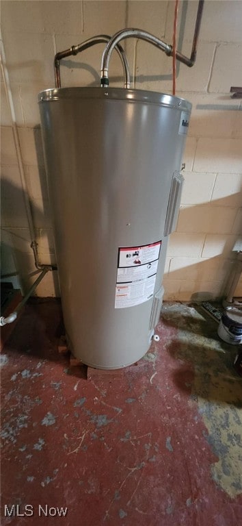 utility room with electric water heater